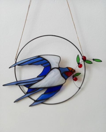 "Pääsuke marja oksaga"