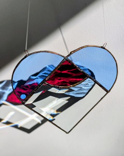 SÜDA, Sinise punasega